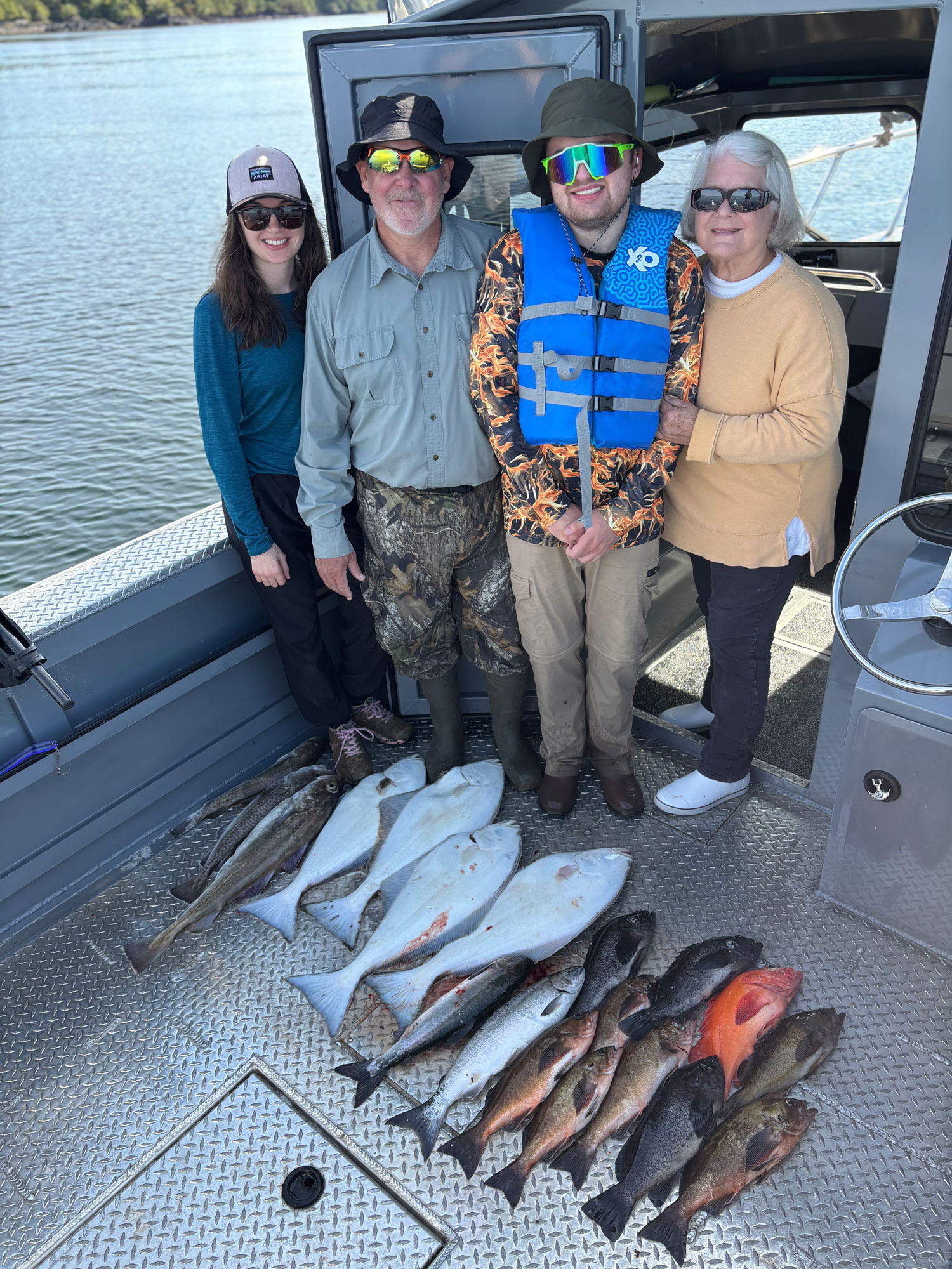 Ketchikan Shore Excursion cruise passengers with fish.